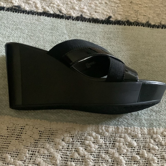 Black pair of platforms. Never worn!!!!! Paid 30 dollars for them. - Picture 7 of 8